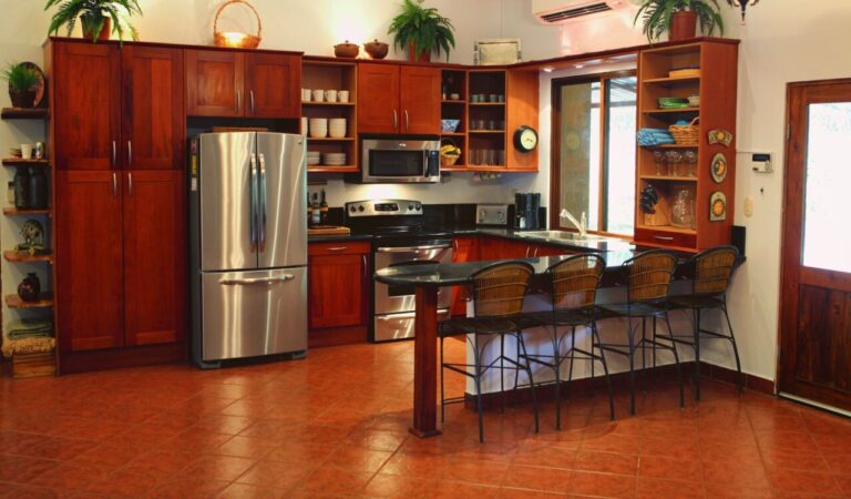 Modern kitchen with stainless appliances in this Costa Rica rental home